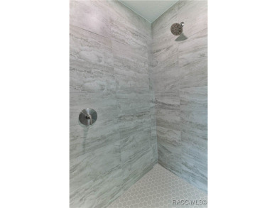 This 3/2/2 is brand new and sits on a third of an acre nicely on Citrus Springs Country Club in Florida - for sale on GolfHomes.com, golf home, golf lot