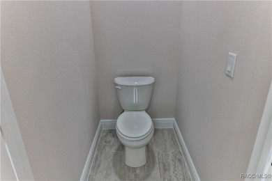 This 3/2/2 is brand new and sits on a third of an acre nicely on Citrus Springs Country Club in Florida - for sale on GolfHomes.com, golf home, golf lot