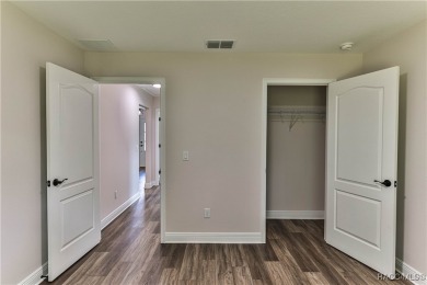 This 3/2/2 is brand new and sits on a third of an acre nicely on Citrus Springs Country Club in Florida - for sale on GolfHomes.com, golf home, golf lot