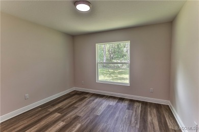This 3/2/2 is brand new and sits on a third of an acre nicely on Citrus Springs Country Club in Florida - for sale on GolfHomes.com, golf home, golf lot