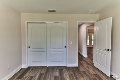 This 3/2/2 is brand new and sits on a third of an acre nicely on Citrus Springs Country Club in Florida - for sale on GolfHomes.com, golf home, golf lot