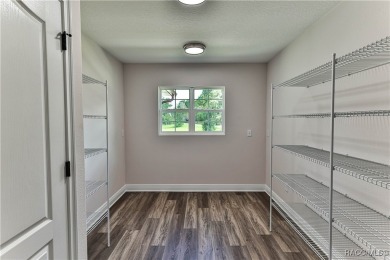 This 3/2/2 is brand new and sits on a third of an acre nicely on Citrus Springs Country Club in Florida - for sale on GolfHomes.com, golf home, golf lot