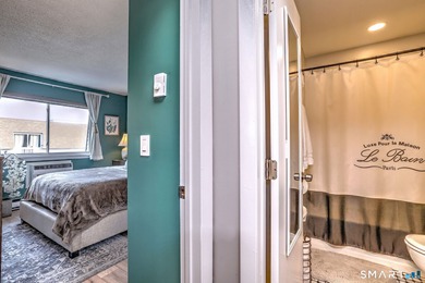 Wake up to peaceful golf and water views in this charming on Short Beach Golf Course in Connecticut - for sale on GolfHomes.com, golf home, golf lot