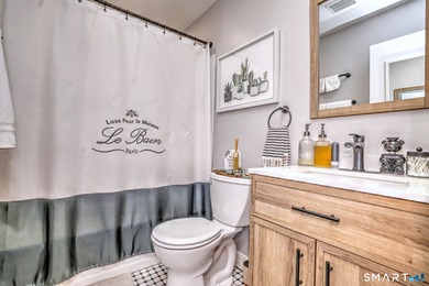 Wake up to peaceful golf and water views in this charming on Short Beach Golf Course in Connecticut - for sale on GolfHomes.com, golf home, golf lot