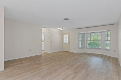 This bright and airy, move-in ready home is a true gem on Timber Pines Golf Course in Florida - for sale on GolfHomes.com, golf home, golf lot