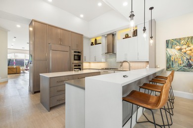 Live in one of the best-selling communities in Northern Palm on The Club At Admirals Cove Golf Village in Florida - for sale on GolfHomes.com, golf home, golf lot