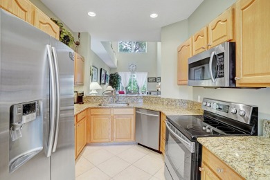 Discover the ultimate lifestyle in this spacious townhome on The Legacy Golf and Tennis Club in Florida - for sale on GolfHomes.com, golf home, golf lot