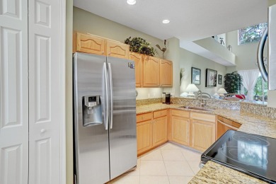 Discover the ultimate lifestyle in this spacious townhome on The Legacy Golf and Tennis Club in Florida - for sale on GolfHomes.com, golf home, golf lot