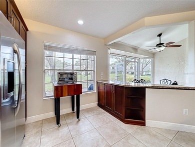 HEATHROW  - RACQUET CLUB VILLAS - Live in the beautiful gated on Heathrow Country Club in Florida - for sale on GolfHomes.com, golf home, golf lot