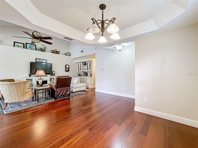 HEATHROW  - RACQUET CLUB VILLAS - Live in the beautiful gated on Heathrow Country Club in Florida - for sale on GolfHomes.com, golf home, golf lot