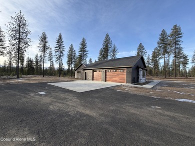 Located in a gated community in Blanchard, Idaho, this 2,252 sq on Stoneridge Golf Club in Idaho - for sale on GolfHomes.com, golf home, golf lot