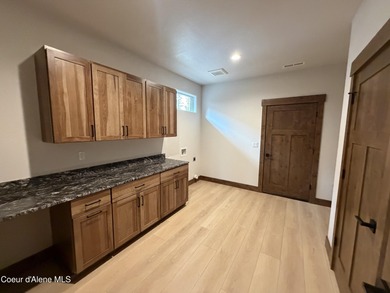 Located in a gated community in Blanchard, Idaho, this 2,252 sq on Stoneridge Golf Club in Idaho - for sale on GolfHomes.com, golf home, golf lot