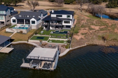 Exceptional waterfront property in Gated Legendary Estates on on Legends in Texas - for sale on GolfHomes.com, golf home, golf lot