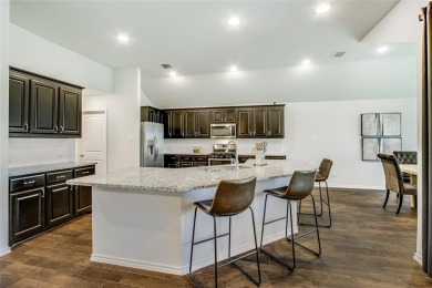 Welcome to this beautifully crafted single-story gem nestled in on Stone River Golf Club in Texas - for sale on GolfHomes.com, golf home, golf lot