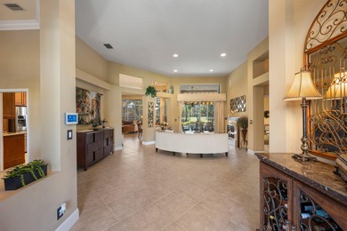 This majestic 6-bedroom plus office estate offers over 4,300 on Binks Forest Golf Club in Florida - for sale on GolfHomes.com, golf home, golf lot