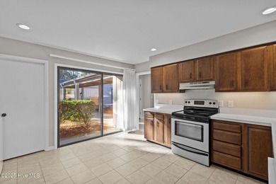 Welcome to this quaint waterfront and golf view Condo. Enjoy on Whispering Pines Golf Course in North Carolina - for sale on GolfHomes.com, golf home, golf lot