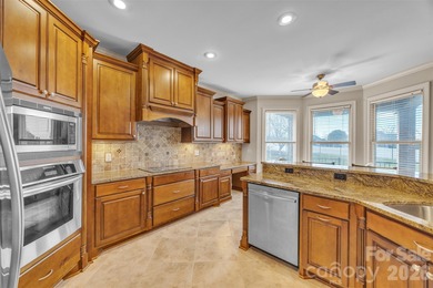 Welcome to the ease and elegance of true golf course living on Rock Barn Golf and Spa in North Carolina - for sale on GolfHomes.com, golf home, golf lot