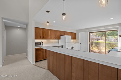 Welcome to this quaint waterfront and golf view Condo. Enjoy on Whispering Pines Golf Course in North Carolina - for sale on GolfHomes.com, golf home, golf lot