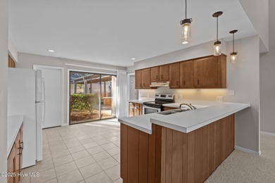 Welcome to this quaint waterfront and golf view Condo. Enjoy on Whispering Pines Golf Course in North Carolina - for sale on GolfHomes.com, golf home, golf lot