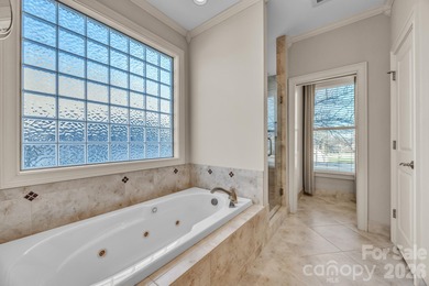 Welcome to the ease and elegance of true golf course living on Rock Barn Golf and Spa in North Carolina - for sale on GolfHomes.com, golf home, golf lot