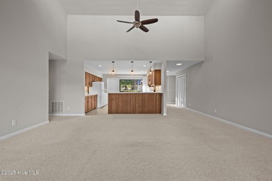 Welcome to this quaint waterfront and golf view Condo. Enjoy on Whispering Pines Golf Course in North Carolina - for sale on GolfHomes.com, golf home, golf lot