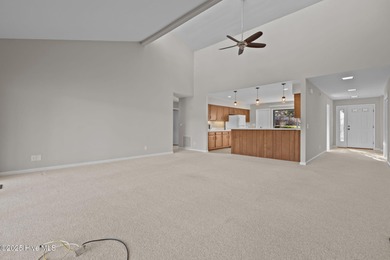 Welcome to this quaint waterfront and golf view Condo. Enjoy on Whispering Pines Golf Course in North Carolina - for sale on GolfHomes.com, golf home, golf lot