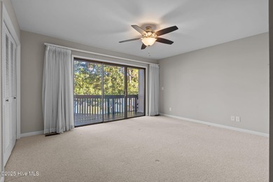 Welcome to this quaint waterfront and golf view Condo. Enjoy on Whispering Pines Golf Course in North Carolina - for sale on GolfHomes.com, golf home, golf lot