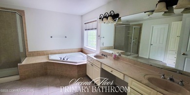 Tucked away on over an acre of wooded privacy, this 5-bedroom on Great Bear Golf and Country Club in Pennsylvania - for sale on GolfHomes.com, golf home, golf lot