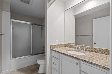 Welcome to this quaint waterfront and golf view Condo. Enjoy on Whispering Pines Golf Course in North Carolina - for sale on GolfHomes.com, golf home, golf lot