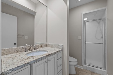 Welcome to this quaint waterfront and golf view Condo. Enjoy on Whispering Pines Golf Course in North Carolina - for sale on GolfHomes.com, golf home, golf lot