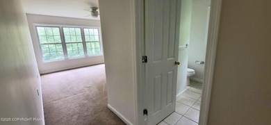Tucked away on over an acre of wooded privacy, this 5-bedroom on Great Bear Golf and Country Club in Pennsylvania - for sale on GolfHomes.com, golf home, golf lot