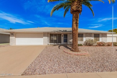 Three bedrooms, 2 bathrooms await you in this home nestled on a on Sun City Lakes West and East in Arizona - for sale on GolfHomes.com, golf home, golf lot