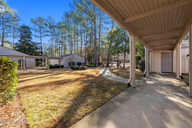 Welcome to this quaint waterfront and golf view Condo. Enjoy on Whispering Pines Golf Course in North Carolina - for sale on GolfHomes.com, golf home, golf lot