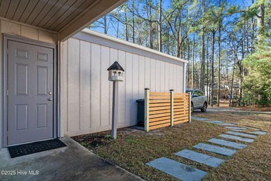 Welcome to this quaint waterfront and golf view Condo. Enjoy on Whispering Pines Golf Course in North Carolina - for sale on GolfHomes.com, golf home, golf lot