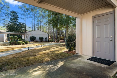 Welcome to this quaint waterfront and golf view Condo. Enjoy on Whispering Pines Golf Course in North Carolina - for sale on GolfHomes.com, golf home, golf lot