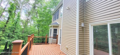 Tucked away on over an acre of wooded privacy, this 5-bedroom on Great Bear Golf and Country Club in Pennsylvania - for sale on GolfHomes.com, golf home, golf lot