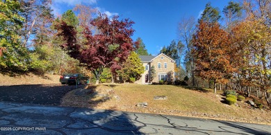 Tucked away on over an acre of wooded privacy, this 5-bedroom on Great Bear Golf and Country Club in Pennsylvania - for sale on GolfHomes.com, golf home, golf lot