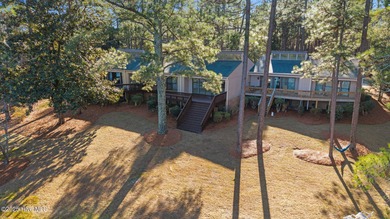 Welcome to this quaint waterfront and golf view Condo. Enjoy on Whispering Pines Golf Course in North Carolina - for sale on GolfHomes.com, golf home, golf lot