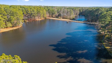 Welcome to this quaint waterfront and golf view Condo. Enjoy on Whispering Pines Golf Course in North Carolina - for sale on GolfHomes.com, golf home, golf lot