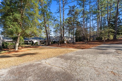 Welcome to this quaint waterfront and golf view Condo. Enjoy on Whispering Pines Golf Course in North Carolina - for sale on GolfHomes.com, golf home, golf lot