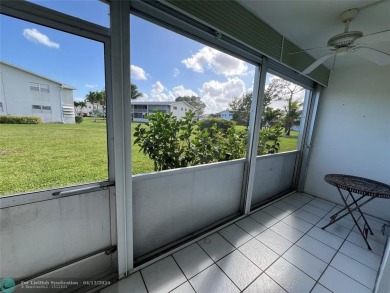 ENJOY THE CONVENIENCE OF FIRST FLOOR LIVING IN THIS ONE BEDROOM on Hillsboro Pines Golf in Florida - for sale on GolfHomes.com, golf home, golf lot