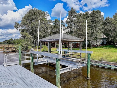 Uncommon riverfront home site in the popular and amenity-rich on Carolina National Golf Club in North Carolina - for sale on GolfHomes.com, golf home, golf lot