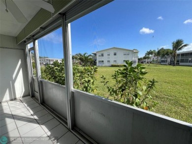 ENJOY THE CONVENIENCE OF FIRST FLOOR LIVING IN THIS ONE BEDROOM on Hillsboro Pines Golf in Florida - for sale on GolfHomes.com, golf home, golf lot