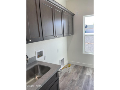 Beautiful new build overlooking the golf course, featuring on Snowflake Municipal Golf Course in Arizona - for sale on GolfHomes.com, golf home, golf lot