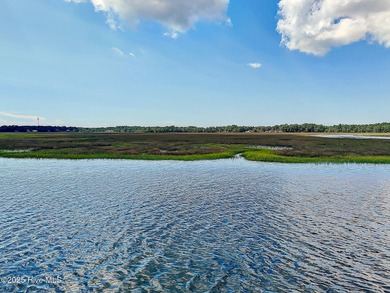 Uncommon riverfront home site in the popular and amenity-rich on Carolina National Golf Club in North Carolina - for sale on GolfHomes.com, golf home, golf lot