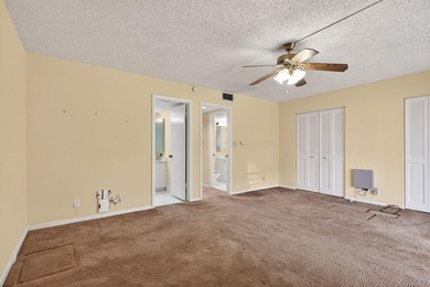 TLC-SALE OF THE CENTURY-POOL IN FRONT OF YOUR BLDG. 1 on Wynmoor Golf Course in Florida - for sale on GolfHomes.com, golf home, golf lot