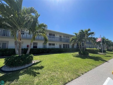 ENJOY THE CONVENIENCE OF FIRST FLOOR LIVING IN THIS ONE BEDROOM on Hillsboro Pines Golf in Florida - for sale on GolfHomes.com, golf home, golf lot