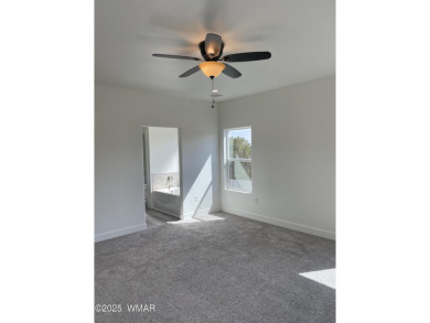 Beautiful new build overlooking the golf course, featuring on Snowflake Municipal Golf Course in Arizona - for sale on GolfHomes.com, golf home, golf lot