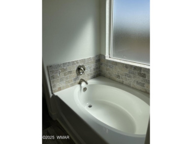 Beautiful new build overlooking the golf course, featuring on Snowflake Municipal Golf Course in Arizona - for sale on GolfHomes.com, golf home, golf lot