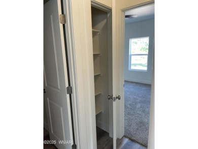 Beautiful new build overlooking the golf course, featuring on Snowflake Municipal Golf Course in Arizona - for sale on GolfHomes.com, golf home, golf lot